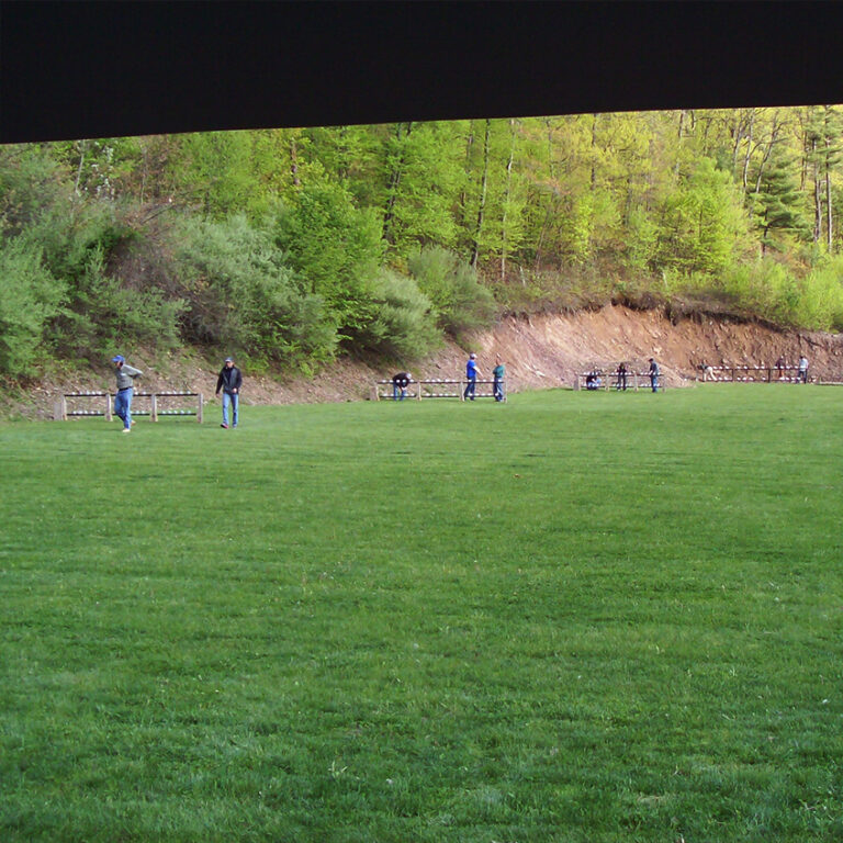 Rifle Range showing people resetting the silhouette targets